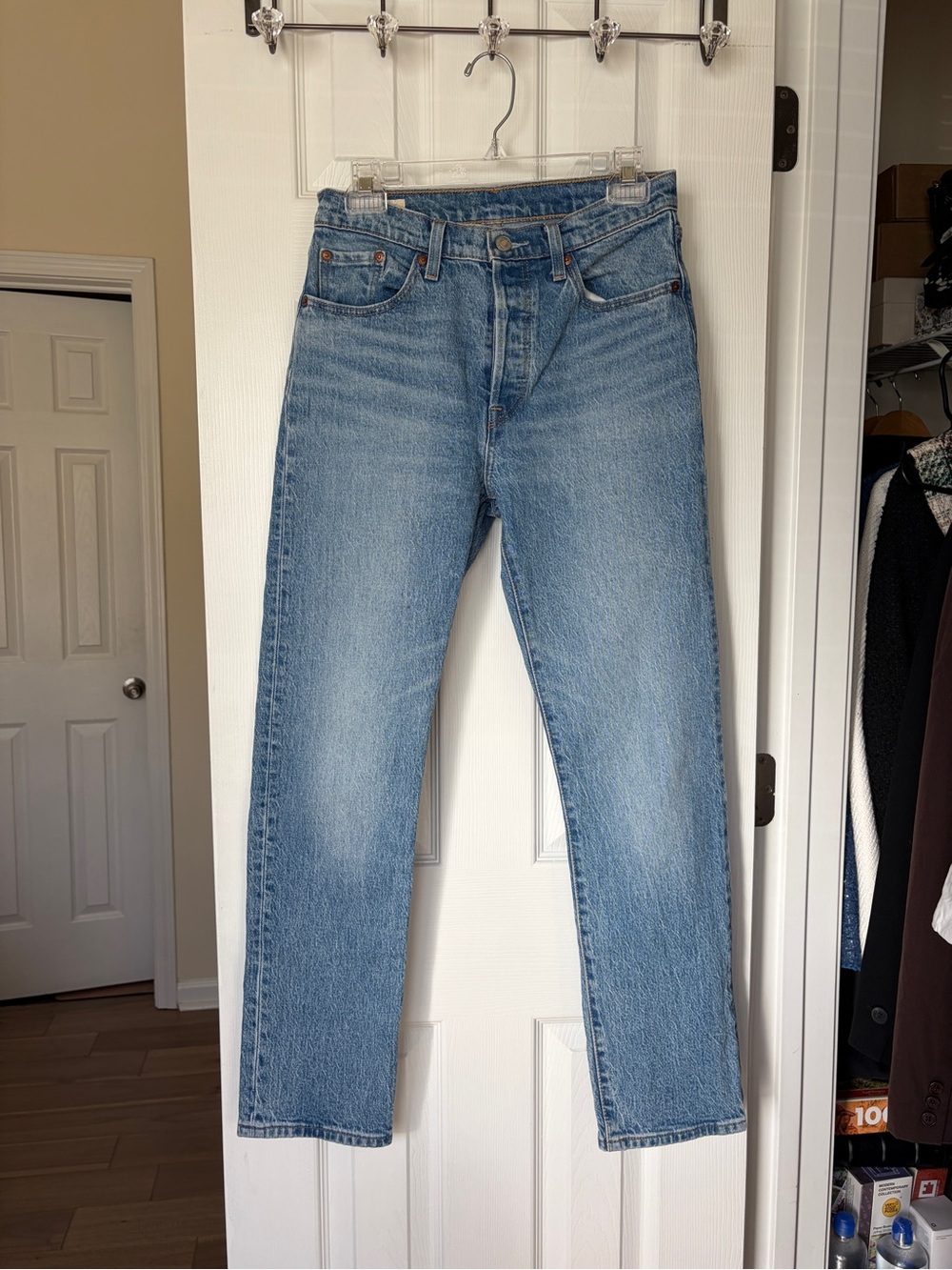 Vintage Levi's 501 high-rise straight-leg jeans in a light-wash US4